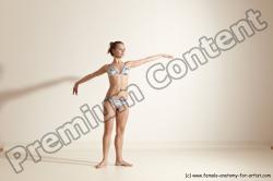 Swimsuit Gymnastic poses Woman White Moving poses Slim long brown Dynamic poses Academic